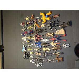 Mixed Collection of Vintage and Modern Action Figures